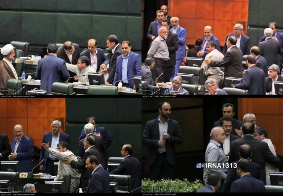 تلاش نمایندگان مجلس برای بیرون بردن نماینده ای که به ظریف فحاشی کرد +عکس